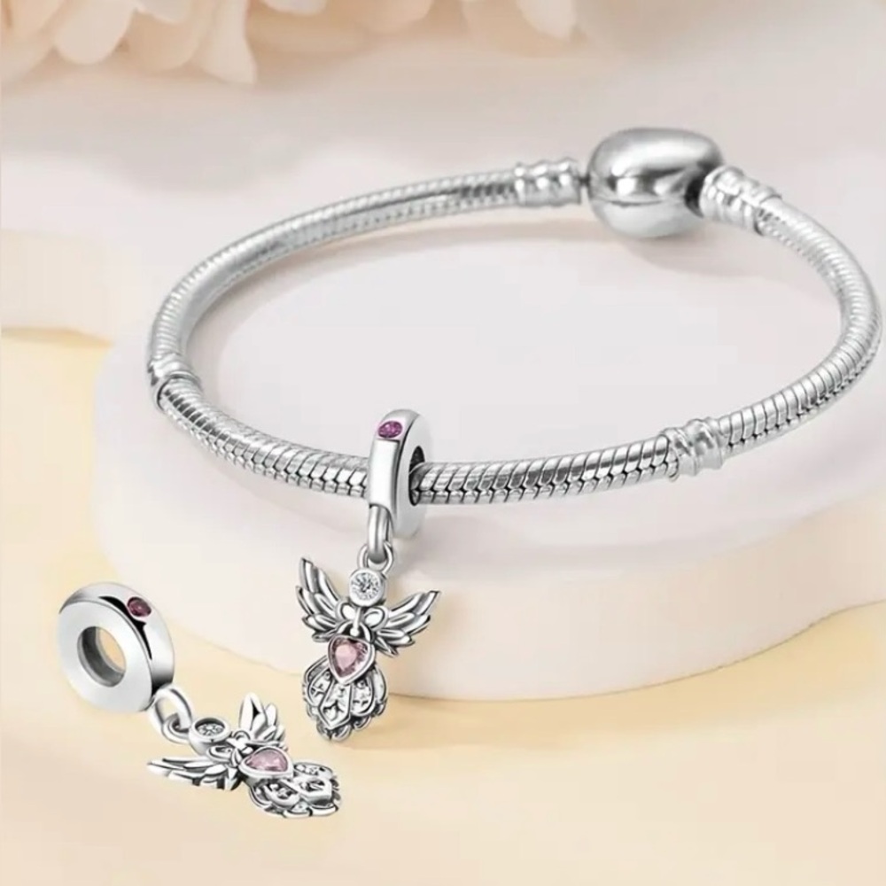 Sterling Silver Angel Charm Pendant with a Pink Gemstone Heart - Picture 4 of 11